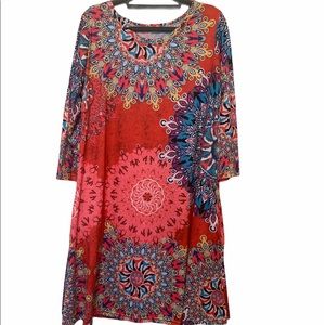 Colorful, midi dress with pockets.